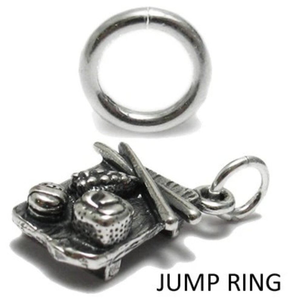 STERLING SILVER JUMP RINGS. 5MM. PACKET OF 10.